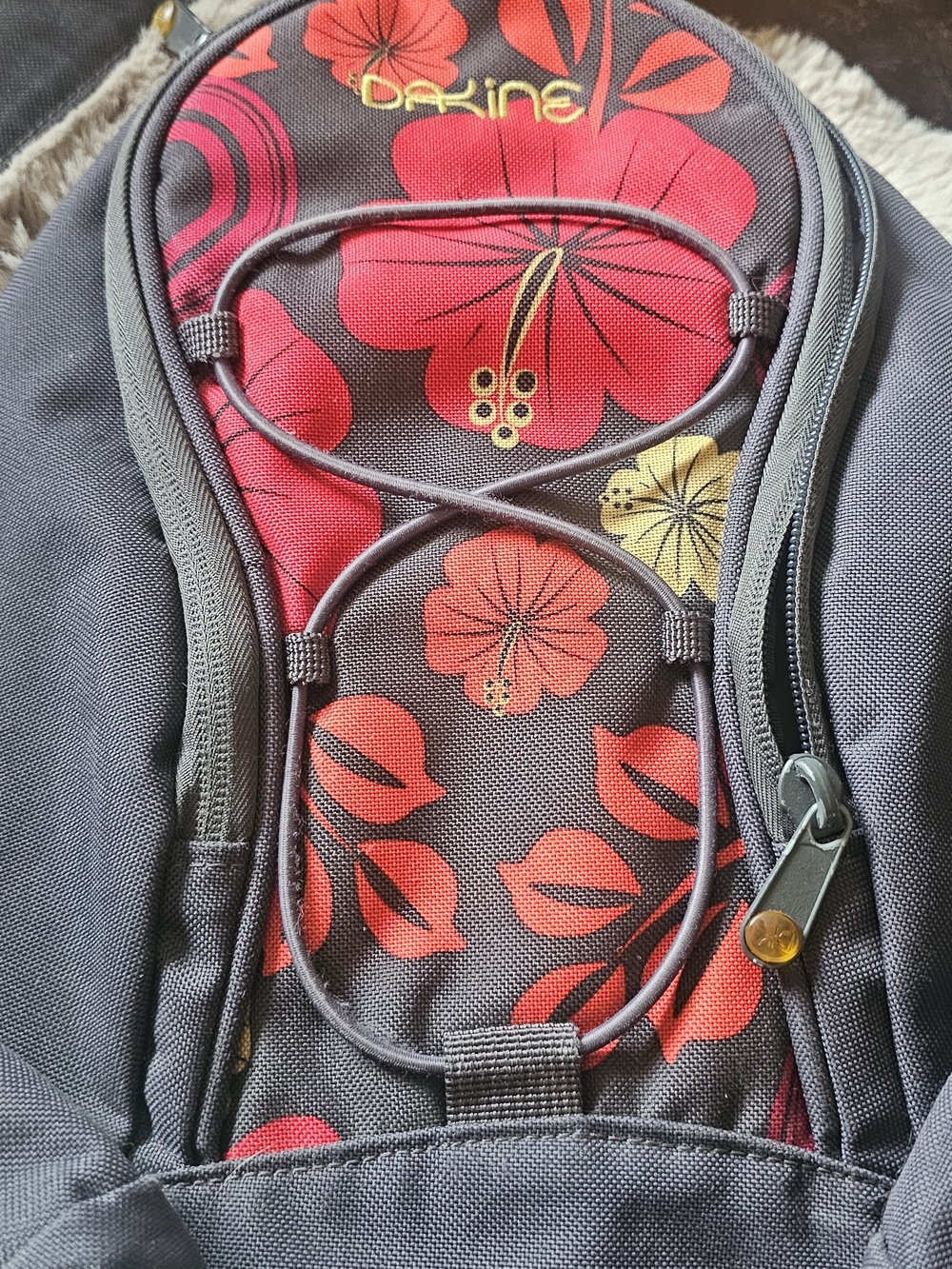 Dakine Gray Backpack with Red and Yellow Floral Accents
